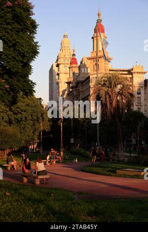 Plaza Mariano Moreno with Edificio De La Inmobiliaria building and Palacio Salvo on Avenida de Mayo in the background.Buenos Aires.Argentina Stock Photo