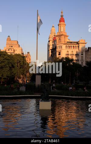 Plaza Mariano Moreno with Edificio De La Inmobiliaria building and Palacio Salvo on Avenida de Mayo in the background.Buenos Aires.Argentina Stock Photo