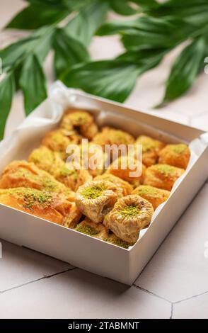 Assortment of Turkish baklava dessert in a  box Stock Photo