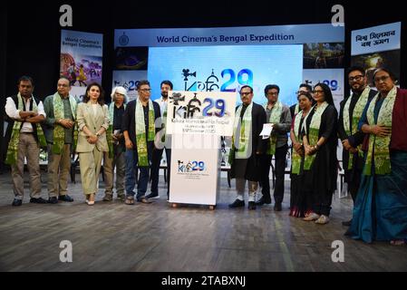 Aroop Biswas, West Bengal State Power Minister, Indranil Sen, Minister of State (IC) for the Department of Technical Education, Training & Skill Development of the Government of West Bengal, tribal actress and minister Birbaha Hansda, actress and MP Mimi Chakraborty, filmmaker Raj Chakraborty, actress June Malia, and Santanu Basu, Secretary of Information and Cultural Affairs, WB, are attending the launch of the 29th Kolkata International Film Festival logo at a press meet in Kolkata, India, on November 29, 2023. (Photo by Debajyoti Chakraborty/NurPhoto) Stock Photo
