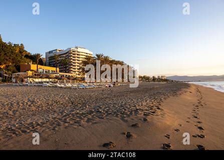 Torremolinos, Spain - September 12, 2023: View of Bajondillo Beach and hotels in Torremolinos at sunrise. Costa del Sol, Spain. Stock Photo