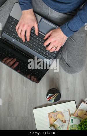 Working in the office, counting money Stock Photo