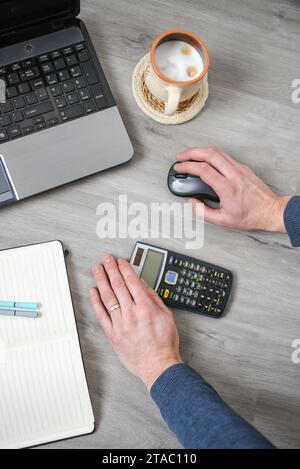 Working in the office, counting money Stock Photo