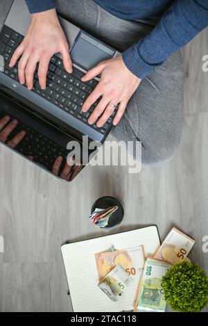 Working in the office, counting money Stock Photo