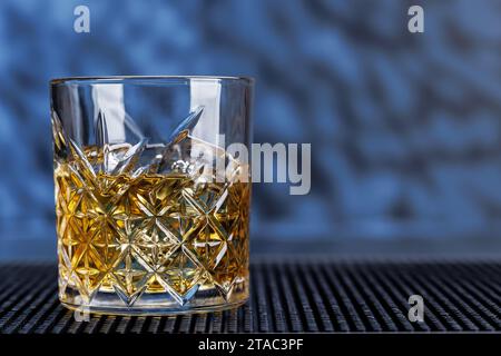Whiskey with crystal clear ice cubes. With copy space Stock Photo