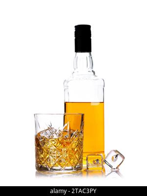 Whiskey with crystal clear ice cubes. Glass and bottle. Isolated on white background Stock Photo