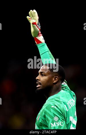 Mike Maignan of Ac Milan gestures during the Uefa Champions League match beetween Ac Milan and Borussia Dortmund at Stadio Giuseppe Meazza on November 28, 2023 in Milano, Italy . Stock Photo