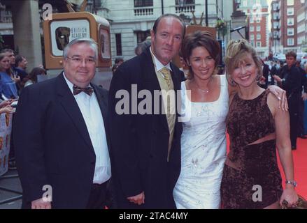 File photo dated 09/05/99 of stars of the Channel Four soap 'Brookside' arriving at the British Academy Television Awards (BAFTAs) at Grosvenor House in London, (left to right) Michael Starke, Dean Sullivan, Claire Sweeney and Sue Jenkins. Actor and director Dean Sullivan, who starred in Brookside, has died at the age of 68, it has been announced. Issue date: Thursday November 30, 2023. Stock Photo