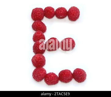 letter E made from raspberries. isolated on white background for birthday party, cards, anniversary, celebration, cookery books Stock Photo