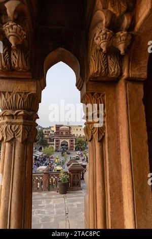 historic entrance gate with people shopping at street at day from unique angle image is taken at sardar market ghantaGhar jodhpur rajasthan india on N Stock Photo