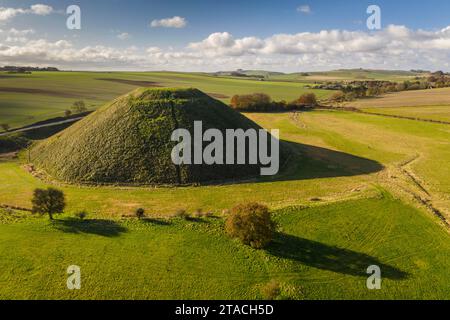 Aerial view of Silbury Hill, a prehistoric artificial mound in Wiltshire, England. Autumn (November) 2021. Stock Photo