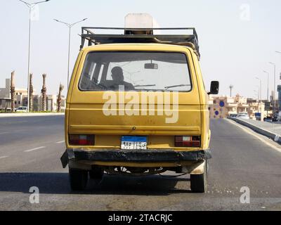 Cairo, Egypt, September 23 2022: A vintage old small bus automobile car, microbus with a new Egyptian plate numbers on the road, a vintage old antique Stock Photo