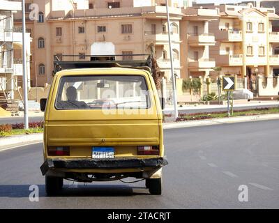 Cairo, Egypt, September 23 2022: A vintage old small bus automobile car, microbus with a new Egyptian plate numbers on the road, a vintage old antique Stock Photo