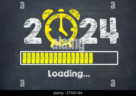 Loading New Year 2024 on Chalkboard Background Stock Photo