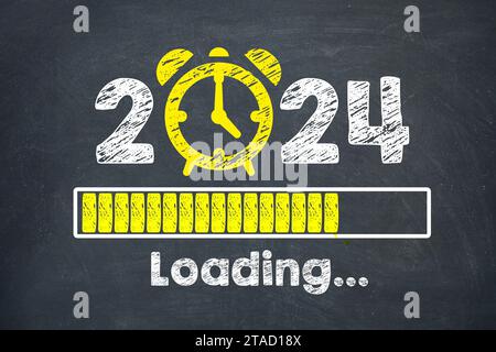 Loading New Year 2024 on Chalkboard Background Stock Photo