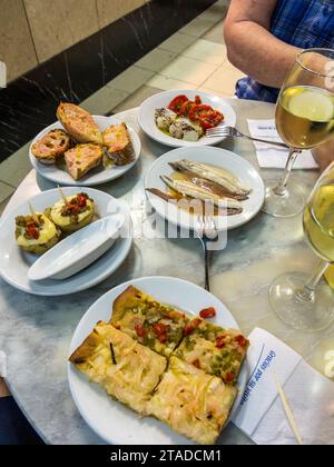 Tapas served at El Xampanyet restaurant's bar, Barcelona, Spain Stock Photo
