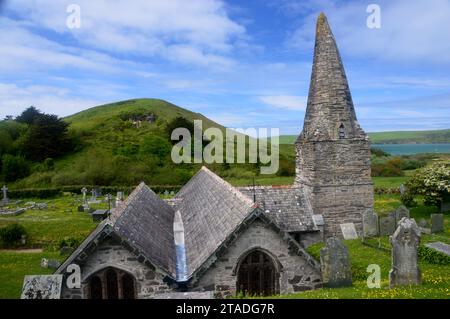 St Enodoc Church Trebetherick in the Parish of St Minver amongst the Sand Dunes on the South West Coastal Path in Daymar Bay, Cornwall, England, UK. Stock Photo