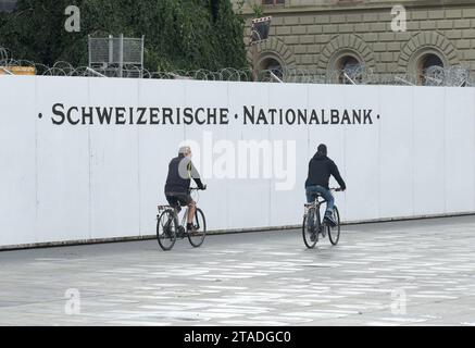 Bern, Switzerland - June 04, 2017: Bicyclists near National Bank of Switzerland in Bern. Stock Photo
