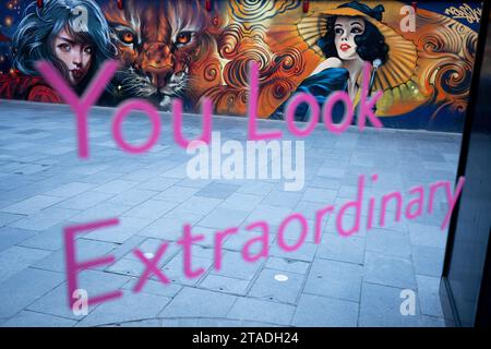 A mirror featuring a message about looking extraordinary, in the West End, on 30th November 2023, in London, England. Stock Photo