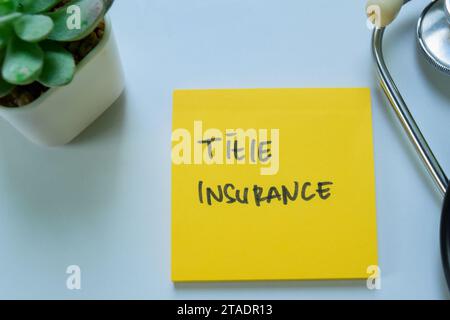 Concept of Title Insurance write on sticky notes with stethoscope isolated on white background. Stock Photo