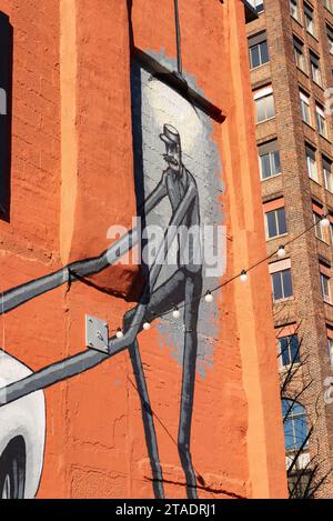 Jackson, Michigan - United States - November 14th, 2023: Mural by artist Tyler Voorhees in downtown Jackson, Michigan. Stock Photo