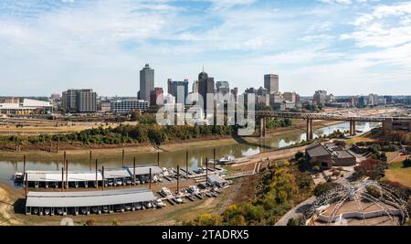 Memphis, TN - 23 October 2023: Memphis Tennessee cityscape with low water levels in the Wolf River Harbor and marina marooning boats Stock Photo