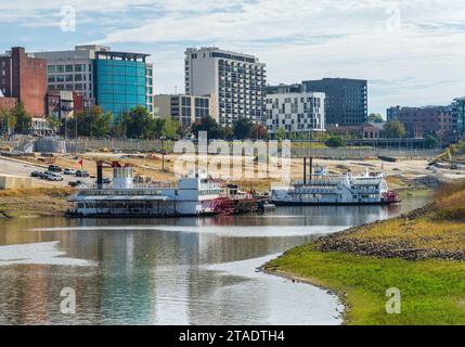 Memphis Tennessee cityscape with low water levels in the Wolf River Harbor with casino river boats almost marooned Stock Photo