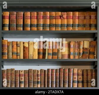 Old law books on bookshelf in the Law Library of the Old State Capitol at 300 W Broadway Street in Frankfort, Kentucky Stock Photo