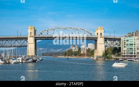 Scenic view at Burrard Bridge from Granville Island, Vancouver, Canada. Vancouver's historic Burrard Bridge on False Creek. travel photo, nobody, copy Stock Photo