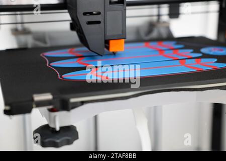 Modern 3D printer and surfboards, closeup Stock Photo