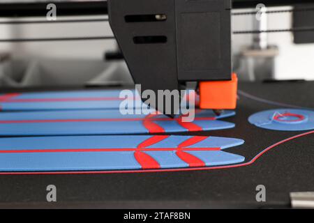 Modern 3D printer and surfboards, closeup Stock Photo