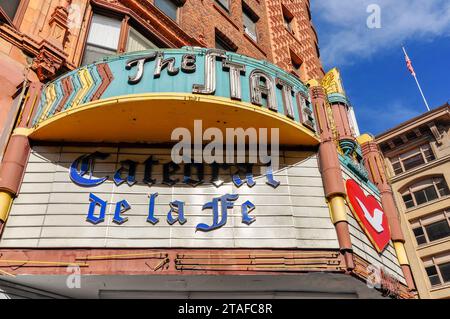 Vintage neon sign of The State Theater, located in the Broadway Theater district in downtown Los Angeles, California, USA. Stock Photo