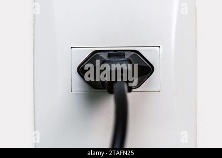 Brazilian plug, New standard of Brazilian plug, NBR 14136 is the official plug standard in Brazil. Three-pin socket with ground conductor. Stock Photo