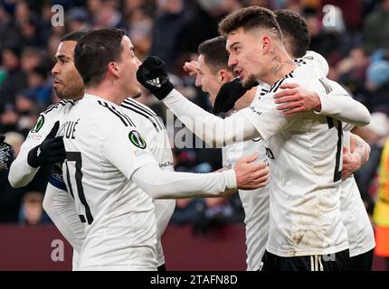 Birmingham, UK. 30th Nov, 2023. Ernest Muci of Legia Warsaw (R) celebrates after scoring during the UEFA Europa Conference League match at Villa Park, Birmingham. Picture credit should read: Andrew Yates/Sportimage Credit: Sportimage Ltd/Alamy Live News Stock Photo