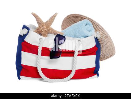 Stylish bag, starfish and other beach accessories isolated on white Stock Photo