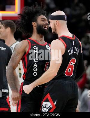 Chicago Bulls Coby White left celebrates with Alex Caruso after