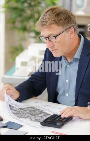businessman checking business data and bars Stock Photo