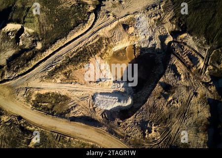 Aerial view of a pit dug in a quarry for the extraction of crushed stone Stock Photo