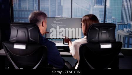 Man Using Computer: Programmer Software Developer Working Stock Photo