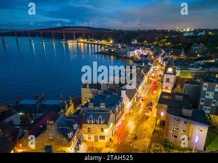 Aerial. View from drone at night along the High Street in South Queensferry village in West Lothian, Scotland, UK Stock Photo