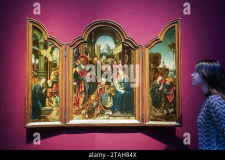 London UK. 1 December  2023. THE MASTER OF 1518 (ACTIVE ANTWERP, EARLY 16TH CENTURY) A Triptych: the central panel: The Adoration of the Magi; the left wing: The Nativity; the right wing: The Flight into Egypt (Estimate). GBP 150,000 – GBP 250,000Christie's Classic  Week spanning art from antiquity to the 21st century. The sale takes place on 9 December at Christie's London. Credit: amer ghazzal/Alamy Live News . Stock Photo