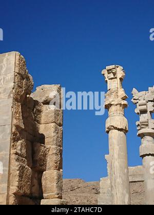 Hieroglyphs carved on the wall of an ancient temple. Remains of Persepolis. Achaemenid period. Antiquities before Christ Stock Photo