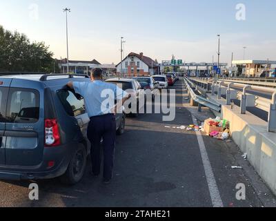 Zahony, Hungary - August 19, 2018: Garbage and the cars on the Zahony-Chop checkpoint on the border with Hungary and Ukraine. Stock Photo