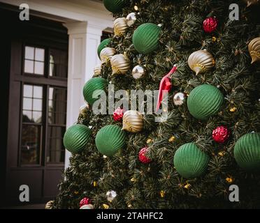 Outdoor Decorated Red and Green christmas Tree Stock Photo