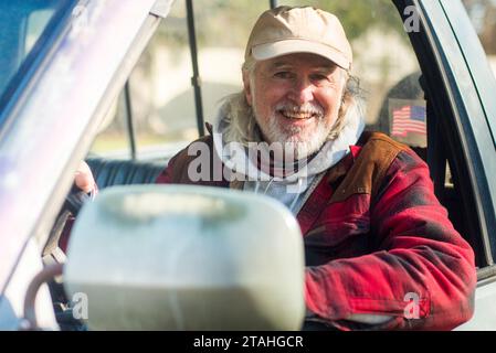 White Rural Guy Senior Rural guy drives old truck Stock Photo - Alamy