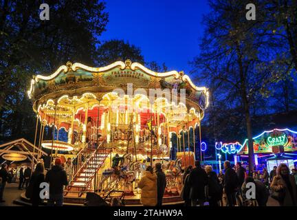 Basel, Switzerland - November 07. 2022: Merry go round at the Basel Autumn Fair (Herbstmesse) in Switzerland Stock Photo