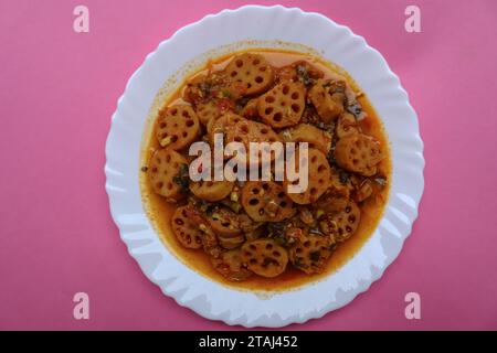 Tasty Lotus stem curry, a side dish made with lotus stem. Kamal kakdi ...