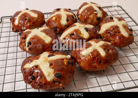 Hot cross buns on wire rack Stock Photo