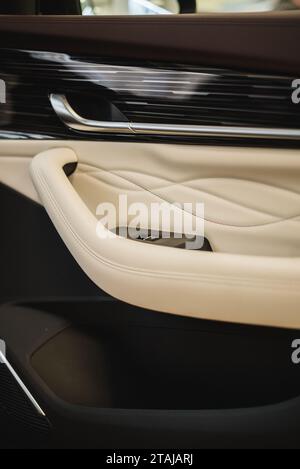 adjusting the lowering of car windows. High quality photo Stock Photo