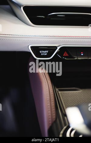 Car start stop system with finger pressing the button. High quality photo Stock Photo